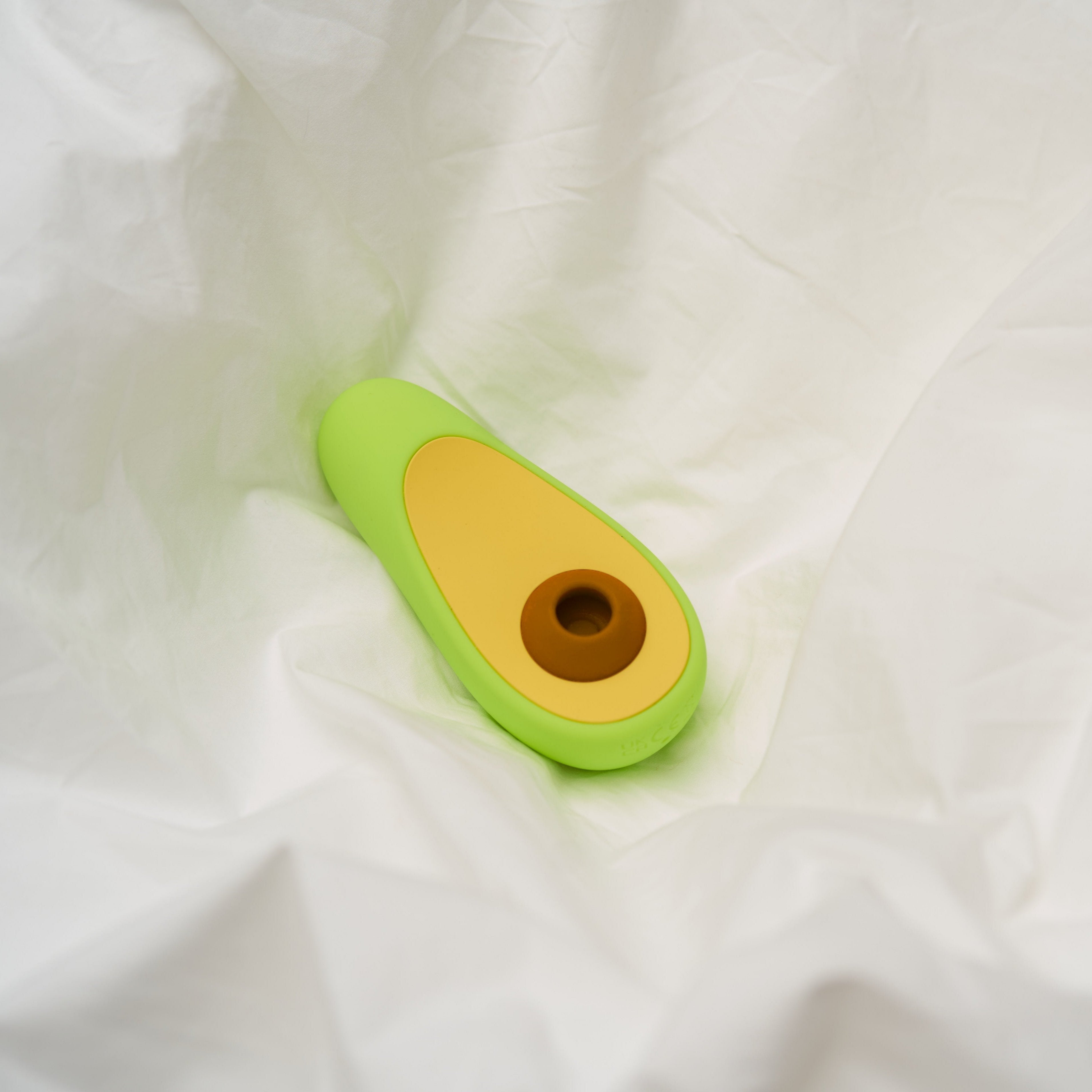 Avocado vibrator with charging cable